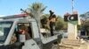 Libyan security forces stand guard in Tripoli, Libya, Aug. 16, 2023. 