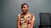 Porcha Woodruff poses in Oak Park, Michigan, Aug. 7, 2023. Woodruff, who was falsely accused of a carjacking, is suing the city of Detroit due to what she says is an overreliance on facial recognition technology. 