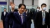 Taiwan’s Vice President William Lai waves inside Taoyuan International Airport following his trip to the United States and Paraguay, in Taoyuan, Taiwan, Aug. 18, 2023.