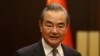 FILE - Chinese Foreign Minister Wang Yi poses as he meets Turkish Foreign Minister Hakan Fidan (not seen) in Ankara, July 26, 2023.
