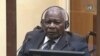 FILE - Felicien Kabuga, an alleged financier of the 1994 genocide in Rwanda, attends a hearing in The Hague, Aug. 18, 2022, in this screengrab taken from handout video footage released by The Mechanism for International Criminal Tribunals (MICT) on Sept. 29, 2022.