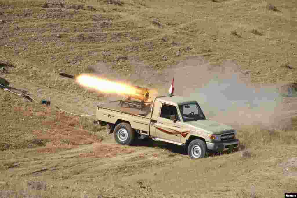 Kurdiston avtonom viloyati xavfsizlik kuchlari Diyala shahri yaqinida jangarilarga qarshi o&#39;t ochmoqda, 14-iyun, 2014-yil.