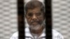 Former Egyptian President Morsi Buried Day After Dying in Court
