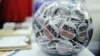 FILE - Buttons reading "Repeal Obamacare" are displayed at the Conservative Political Action Conference (CPAC) in Washington, Feb. 9, 2012. 