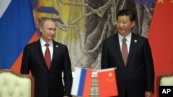 Rossiya prezidenti Vladimir Putin va Xitoy rahbari Si Zinpin Shanxayda, 21-may, 2014 