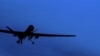 FILE - A U.S. drone flies over northwestern Pakistan.