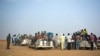 FILE - Nigeriens and third-country migrants head towards Libya from Agadez, Niger on Monday, June 4, 2018. 
