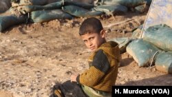 FILE - Children fleeing their homes in Iraq rarely receive mental health treatment, despite often being victims of or witnesses to extreme violence. Haj Ali, Iraq, Feb. 28, 2018.