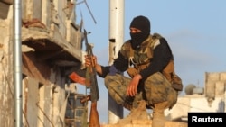 Al-Nusra jangarisi Suriyaning Idlib viloyati, Ariha shahrida. 2015-yil may. 