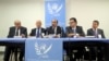 The leader of Syria's Western-backed opposition group Ahmad Al-Jarba (C) speaks to reporters after an informal Security Council meeting on the situation in Syria, July 26, 2013, at United Nations headquarters. 
