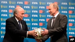 FIFA rahbari Zepp Blatter, Rossiya prezidenti Vladimir Putin.