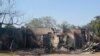 Gidajen da suka kone bayan hare-haren Boko Haram a bama, Fabrairu 20, 2014.
