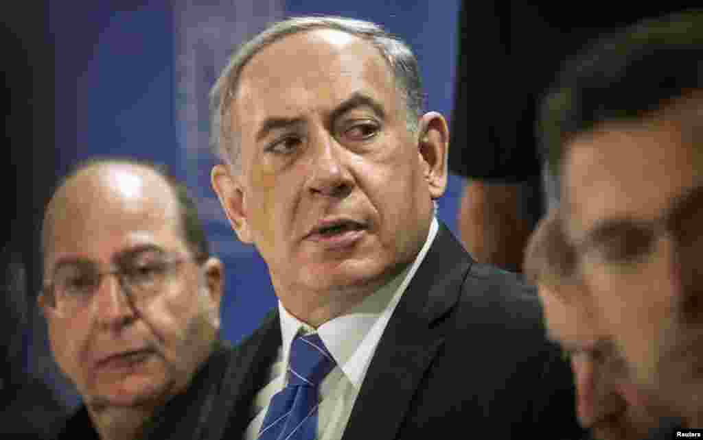Isroil Bosh vaziri Benyamin Netanyaxu (o'ngda) vazirlari bilan, Tel-Aviv, Isroil, 31-iyul, 2014-yil.