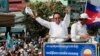 FILE - In this June 2, 2017, file photo, opposition party Cambodia National Rescue Party (CNRP) leader Kem Sokha greets his supporters at a rally in Phnom Penh. 