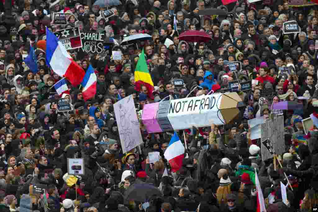 Thousands of people began filling France&rsquo;s iconic Place de la Republique, Jan. 11, 2015, in a rally of defiance and sorrow to honor the 17 victims of three days of bloodshed that left France on alert for more violence.