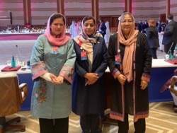 Qatardagi muzokaralarda qatnashayotgan afg'on ayollari