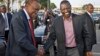 Before departing for AU summit in Addis Ababa, Kenyan President Kenyatta, left, with Deputy President Ruto, Nairobi, Kenya, Oct. 12, 2013.