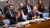 Jordanian Foreign Minister and President of the U.N. Security Council Nasser Judeh (r) listens to U.N. Secretary-General Ban Ki-moon at U.N. headquarters, Jan. 20, 2014.