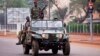Seleka soldiers drive along a road in Bangui December 5, 2013.