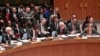 FILE - U.N. Russian Ambassador Vitaly Churkin, far left, listens as U.S. Ambassador to the U.N. Samantha Power, far right, speaks during a meeting of the U.N. Security Council meeting on Ukraine, March 3, 2014, at U.N. headquarters.