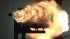 This photograph, taken from a high-speed video camera, shows a record-setting firing of an electromagnetic railgun at Naval Surface Warfare Center, Dahlgren, Virginia, Jan. 31, 2008. (Photo courtesy of U.S. Navy)