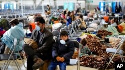 AQShning Germaniyadagi "Ramshtayn" harbiy-havo bazasiga keltirilgan afg'on qochqinlari