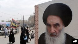 Iroqda shialar diniy rahnamosi Oyatulla Ali al-Sistaniyning surati 