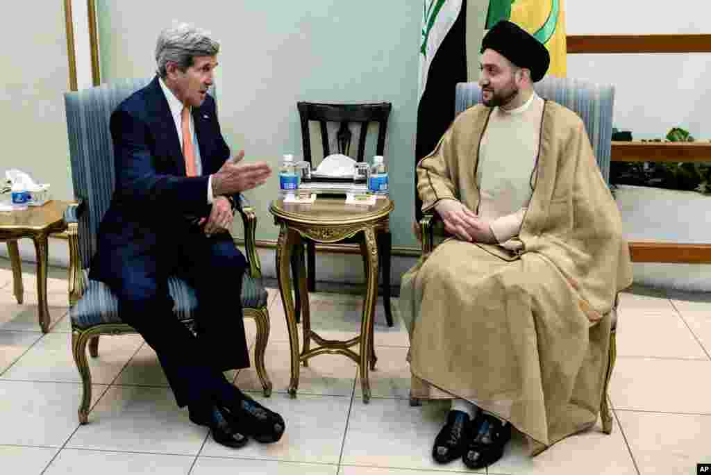 AQSh Davlat kotibi Jon Kerri (chapda) Iroq Oliy islomiy kengashi rahbari Sayyid Amar Al-Hakim bilan uchrashmoqda, Bag&#39;dod, Iroq, 23-iyun, 2014-yil.
