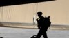 FILE - A U.S. soldier is seen during a handover ceremony of Taji military base from U.S.-led coalition troops to Iraqi security forces, in the base north of Baghdad, Iraq, Aug. 23, 2020. 
