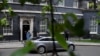 FILE - Britain's Prime Minister Theresa May leaves 10 Downing Street, as she faces a vote on alternative Brexit options, in London, March 27, 2019. 